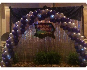 Balloon arch with "Prom Night" sign.