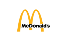 Golden arches logo on black background.