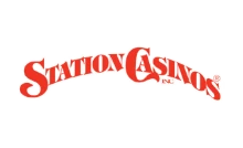 Station Casinos logo on black background.