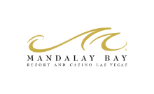 Gold abstract swirl on black background.