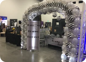 Balloon arch at an event entrance.