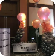 Balloon decorations at an indoor event.