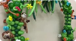 Jungle-themed balloon arch with monkeys.